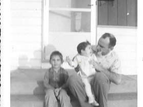 1962 Sept. John, Zann Dad Arbor porch.jpg